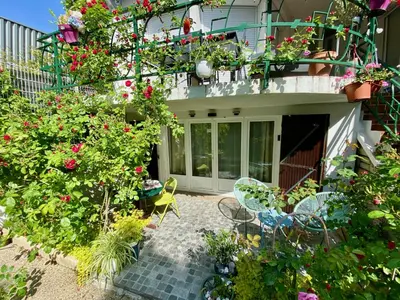 Jardin de l'établissement Studio avec terrasse charmante à -10mn du métro 4