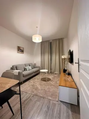 Coin salon dans l'établissement PARIS - La Défense Magnifique Appartement