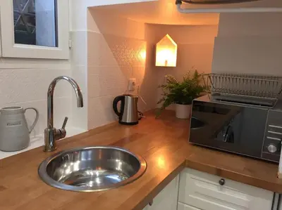 Cuisine ou kitchenette dans l'établissement PARIS - La Défense Magnifique Appartement