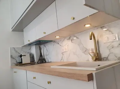 Cuisine ou kitchenette dans l'établissement Cocon chic parisien niché au cœur de Montmartre