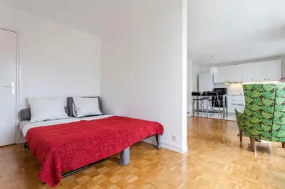 Un ou plusieurs lits dans un hébergement de l'établissement Paris center Apartment luxury