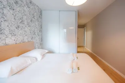 Un ou plusieurs lits dans un hébergement de l'établissement Confort Absolu à Paris ,superbe appartement rénové 7 Chambres avec salles de Bain privatives