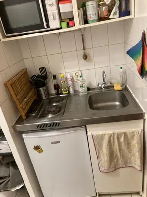 Cuisine ou kitchenette dans l'établissement Studio Levallois-Perret 20 m2 rue Jean Jaures
