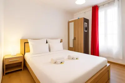 Un ou plusieurs lits dans un hébergement de l'établissement GuestReady - Bel appartement cosy dans le 3e arr.