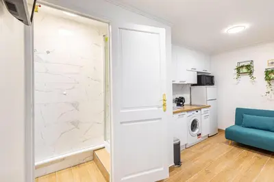 Cuisine ou kitchenette dans l'établissement GuestReady - Bel appartement cosy dans le 3e arr.