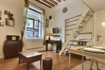 Télévision ou salle de divertissement dans l'établissement Le Saint Claude