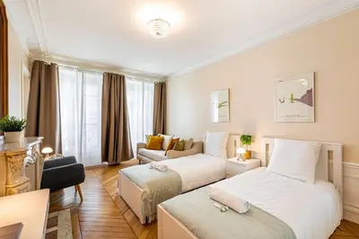 Un ou plusieurs lits dans un hébergement de l'établissement GuestReady - Bel apt proche du Louvre