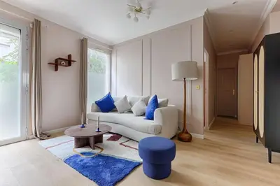 Coin salon dans l'établissement MyKeypers - Luxury Flat 3BR 8P with Jacuzzi - Haussmann