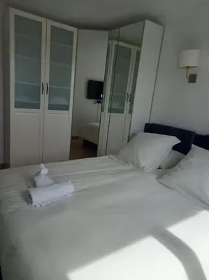 Un ou plusieurs lits dans un hébergement de l'établissement Superbe appartement à Paris