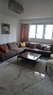 Coin salon dans l'établissement Superbe appartement à Paris