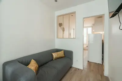 Télévision ou salle de divertissement dans l'établissement Appartement cosy canal Saint Martin