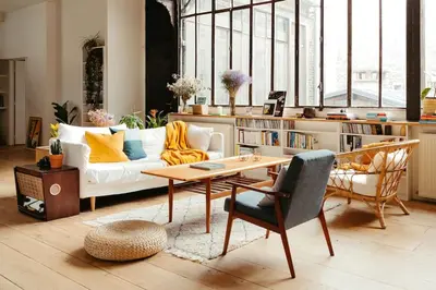 Coin salon dans l'établissement Sublime loft avec verrières sur le Canal St Martin