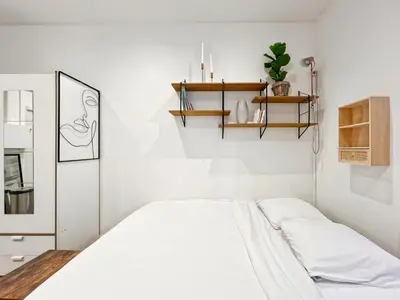 Un ou plusieurs lits dans un hébergement de l'établissement Functional apartment, Belleville, Paris 11