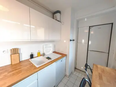 Cuisine ou kitchenette dans l'établissement 3 pièces proche Tour Eiffel