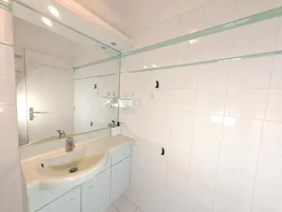 Salle de bains dans l'établissement 3 pièces proche Tour Eiffel