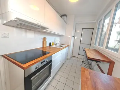 Cuisine ou kitchenette dans l'établissement 3 pièces proche Tour Eiffel