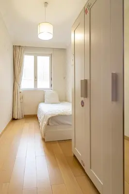 Un ou plusieurs lits dans un hébergement de l'établissement 5-bedroom spacious and cosy flat close to the Eiffel Tower