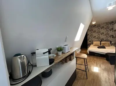 Un ou plusieurs lits dans un hébergement de l'établissement Fully renovated studio for 2