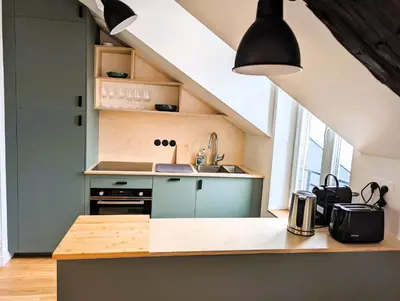 Cuisine ou kitchenette dans l'établissement Appart sur les toits de Paris - Marais Volta