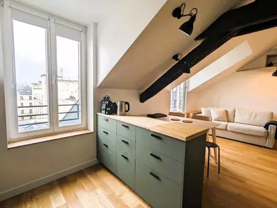 Cuisine ou kitchenette dans l'établissement Appart sur les toits de Paris - Marais Volta