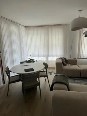 Coin salon dans l'établissement Appartement Cosy, proche Stade de France