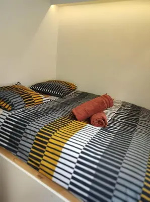 Un ou plusieurs lits dans un hébergement de l'établissement Elegant Escape in Paris 14th