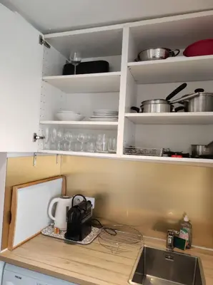 Cuisine ou kitchenette dans l'établissement Elegant Escape in Paris 14th