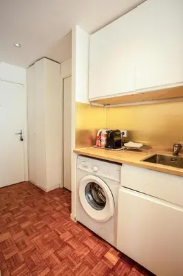 Cuisine ou kitchenette dans l'établissement Elegant Escape in Paris 14th