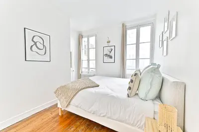 Un ou plusieurs lits dans un hébergement de l'établissement Appartement parisien spacieux #Marais #Rivoli