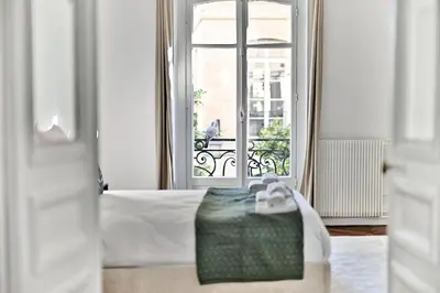 Un ou plusieurs lits dans un hébergement de l'établissement Appartement parisien spacieux #Marais #Rivoli