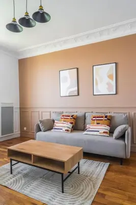 Coin salon dans l'établissement Appartement spacieux Vue sur Tour Effeil - Puteaux
