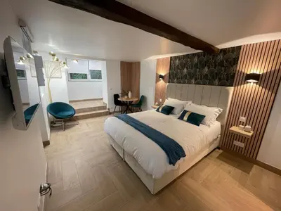 Un ou plusieurs lits dans un hébergement de l'établissement Eiffel Tour Cosy Jade