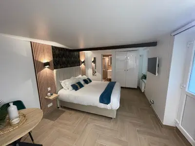 Un ou plusieurs lits dans un hébergement de l'établissement Eiffel Tour Cosy Jade