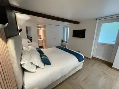 Un ou plusieurs lits dans un hébergement de l'établissement Eiffel Tour Cosy Jade