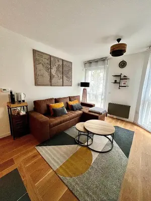 Coin salon dans l'établissement New & serene 1-bedroom apart near #LaDéfenseParis #Parking&Fibre
