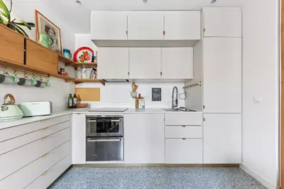 Cuisine ou kitchenette dans l'établissement Appartement cosy au cœur du Marais