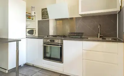 Cuisine ou kitchenette dans l'établissement Deux pièces spacieux - Métro ligne 14 à 50m