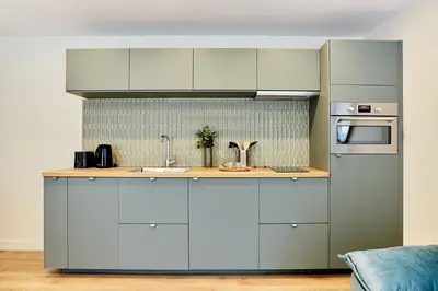 Cuisine ou kitchenette dans l'établissement Résidence Centre de Paris by Studioprestige
