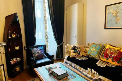 Coin salon dans l'établissement Élysées Charm