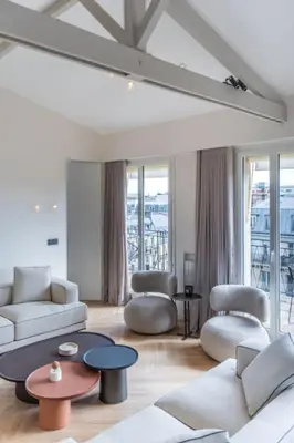 Coin salon dans l'établissement Luxueux Appartement Haussmannien avec Vue sur Paris