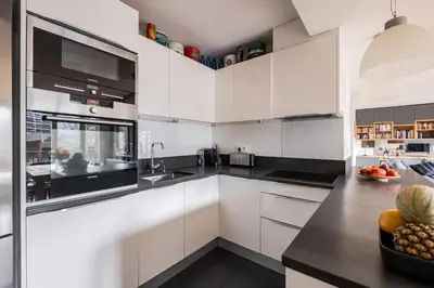 Cuisine ou kitchenette dans l'établissement Veeve - Grand in Grey