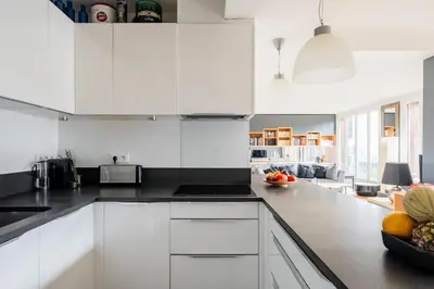 Cuisine ou kitchenette dans l'établissement Veeve - Grand in Grey