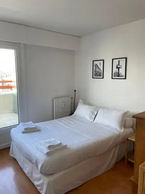 Un ou plusieurs lits dans un hébergement de l'établissement Home F8 - Terrace Paris's view, Eiffel Tower area