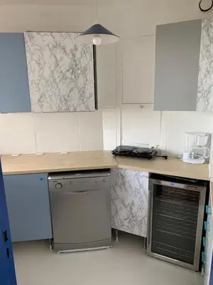 Cuisine ou kitchenette dans l'établissement Paris La Défense - Santorin Apartment with jacuzzi