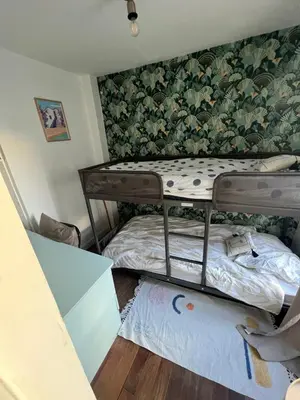Un ou plusieurs lits dans un hébergement de l'établissement Charming apartment 40 m2, 10th