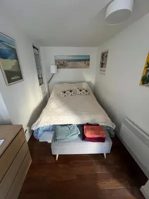 Un ou plusieurs lits dans un hébergement de l'établissement Charming apartment 40 m2, 10th