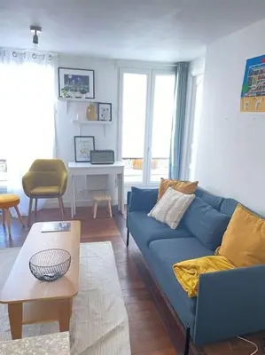 Coin salon dans l'établissement Charming apartment 40 m2, 10th