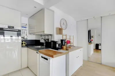 Cuisine ou kitchenette dans l'établissement Cozy studio - 2P - Place de la Bourse