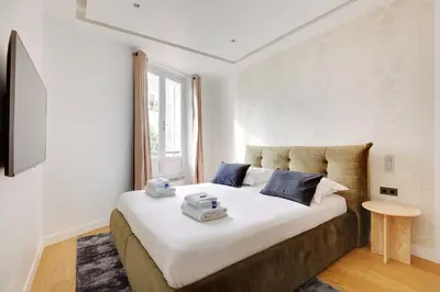 Un ou plusieurs lits dans un hébergement de l'établissement Cosy & chic studio - 2P - Levallois