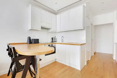 Cuisine ou kitchenette dans l'établissement Cosy & chic studio - 2P - Levallois